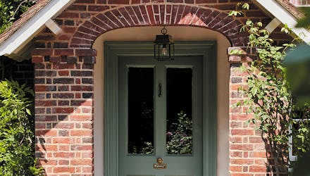 Painted front door brick entryway